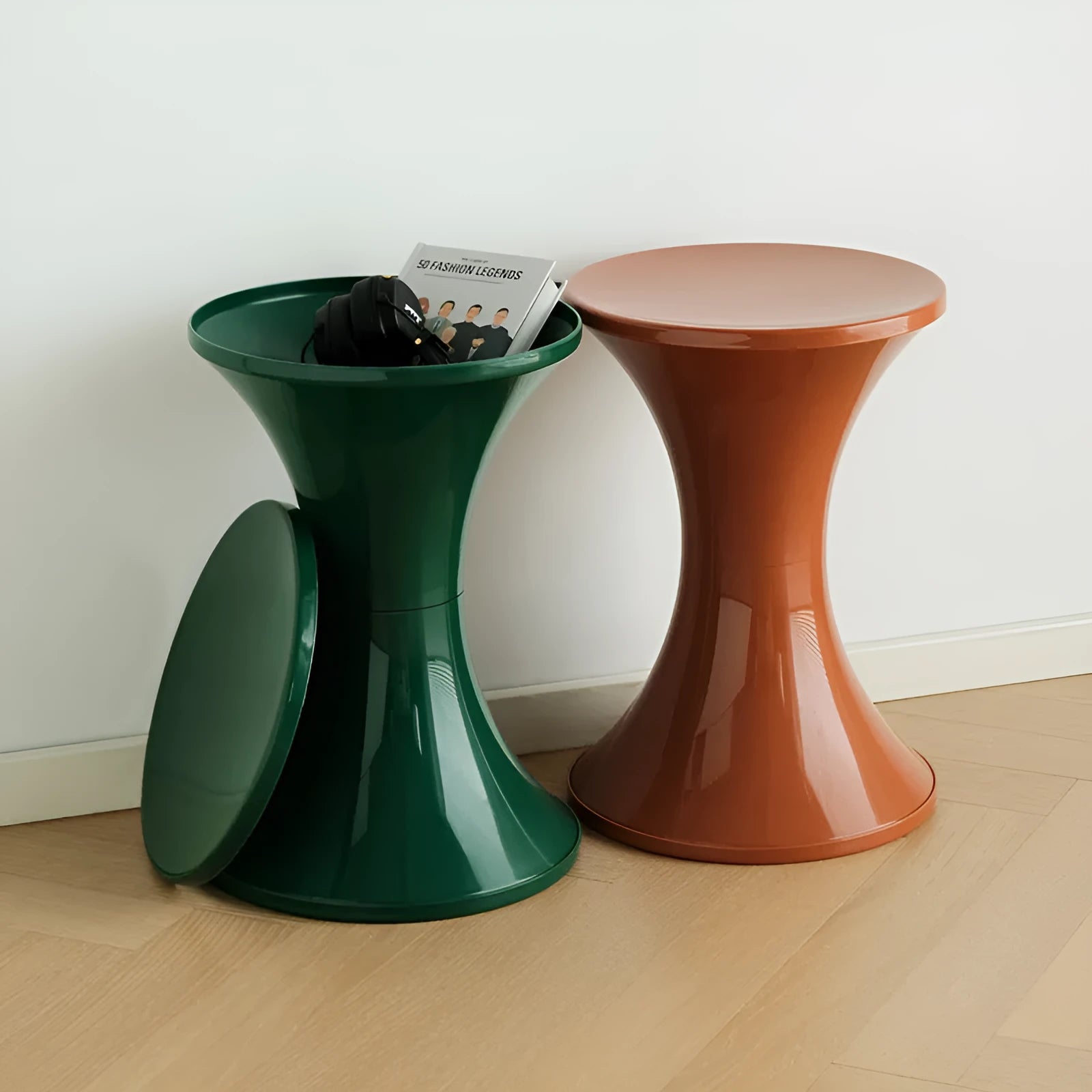 A plastic hourglass-shaped shoe changing stool in a choice of colours.