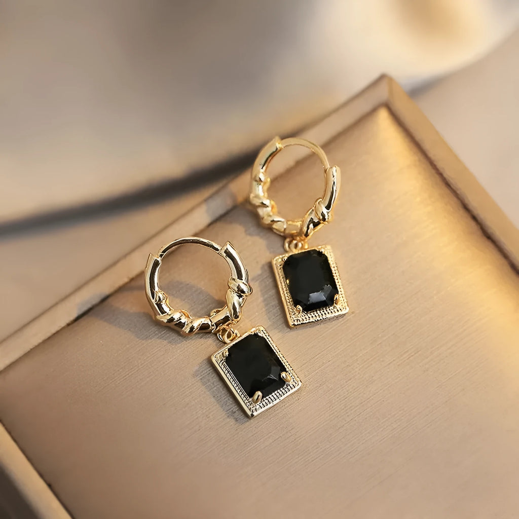 Geometric quadrilateral copper earrings with black zircon detailing in E2506 Black colour