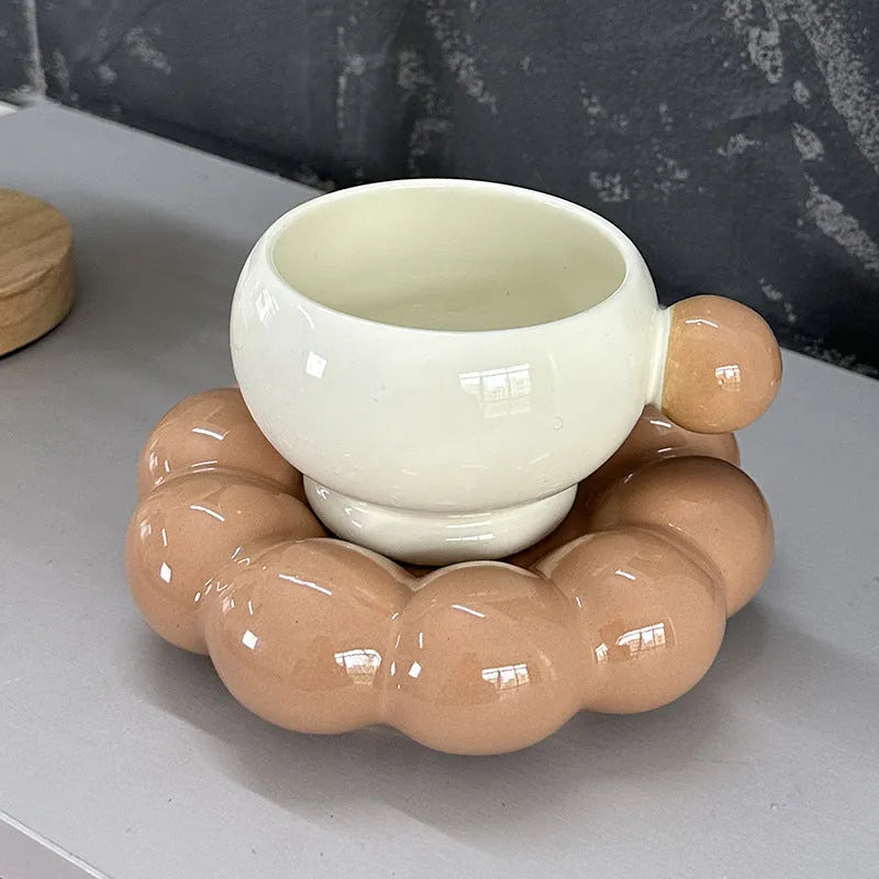 Nordic style ceramic coffee set with a 250ml cup and matching dish in a solid colour.