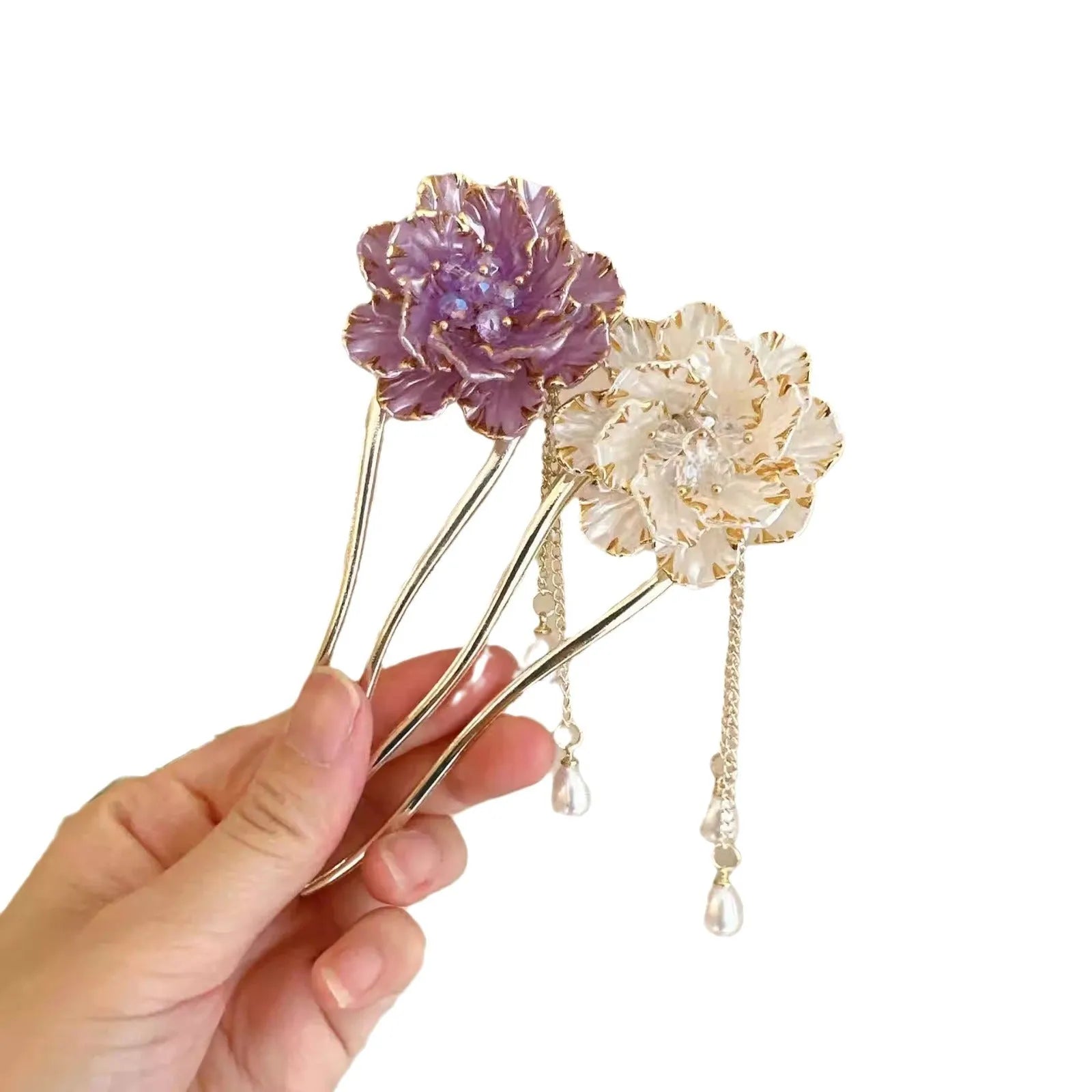 Close-up of a retro-style U-shaped alloy hair clip with a purple peony flower and tassel decoration.