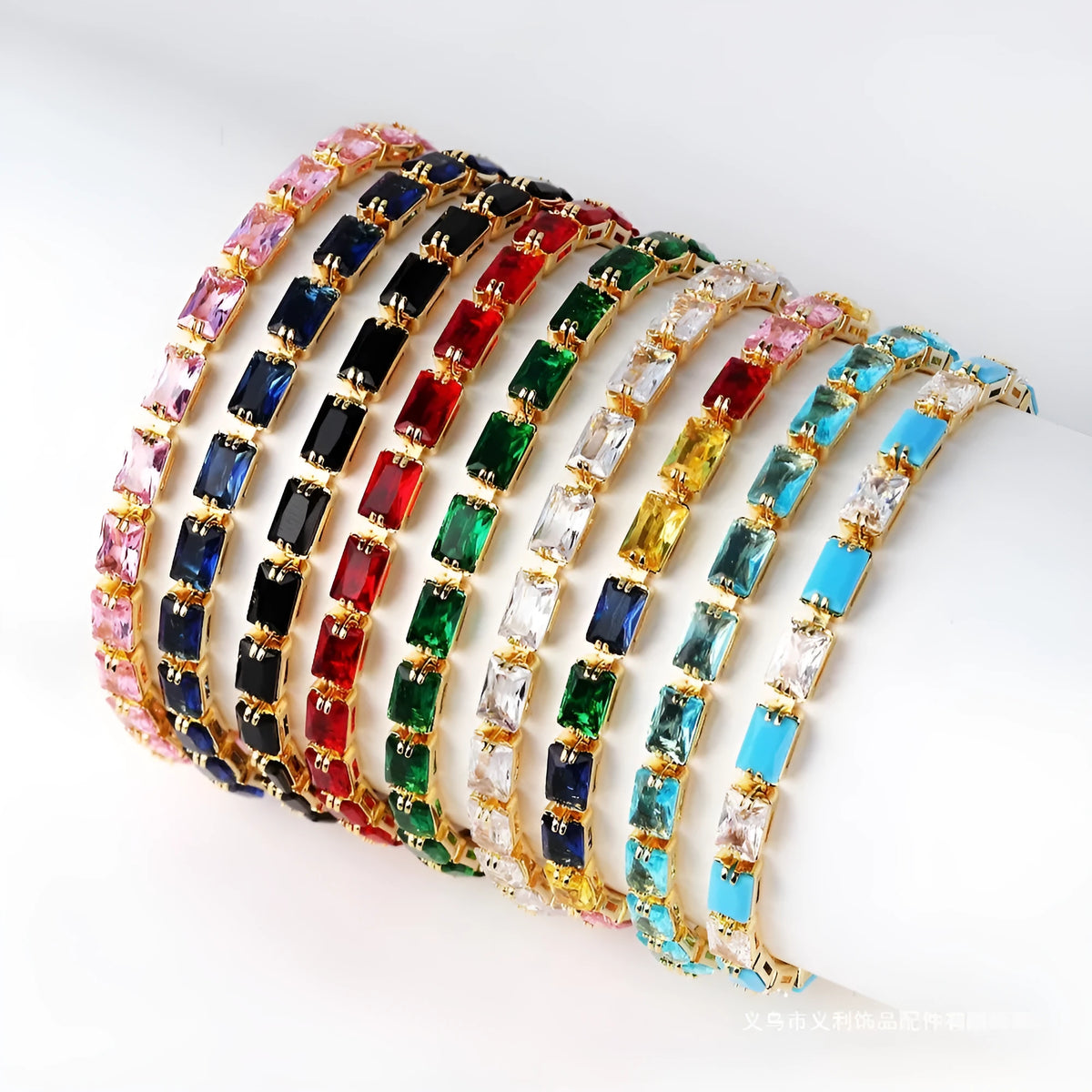 Close-up of a women's ins style bracelet with electroplated alloy band and sparkling zircon stones in a choice of colours.