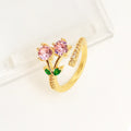 Women's copper geometric open ring with micro-inlaid leaf design or pink detail, gold plated finish
