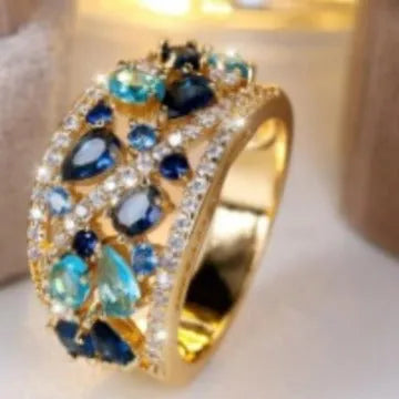 Women's round hollow fashion ring in copper showing openwork design with colour choice options
