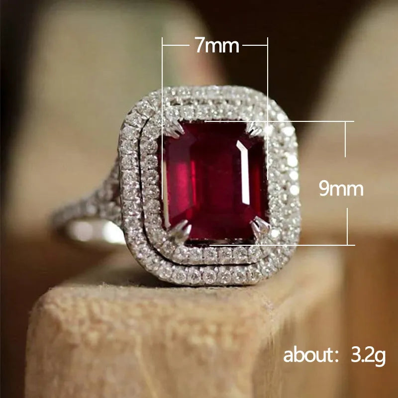 Red copper square geometric ring with rhinestone centrepiece for women, showing metallic construction