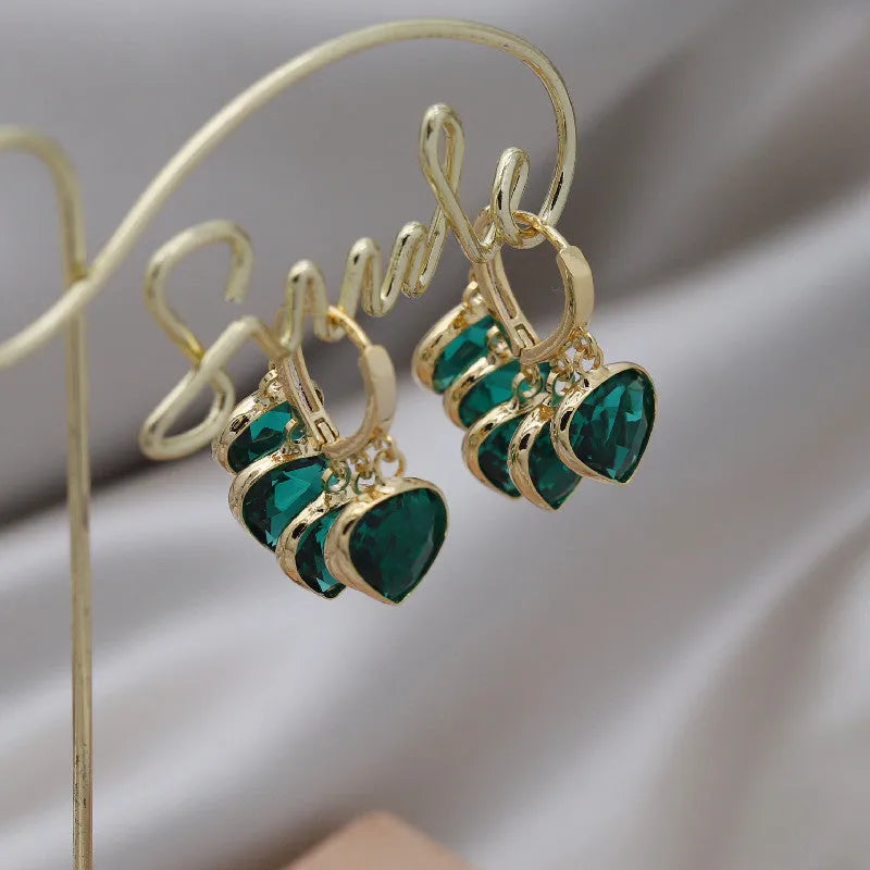 Green heart pendant glass ear clip earrings with Korean style design and alloy gemstone details