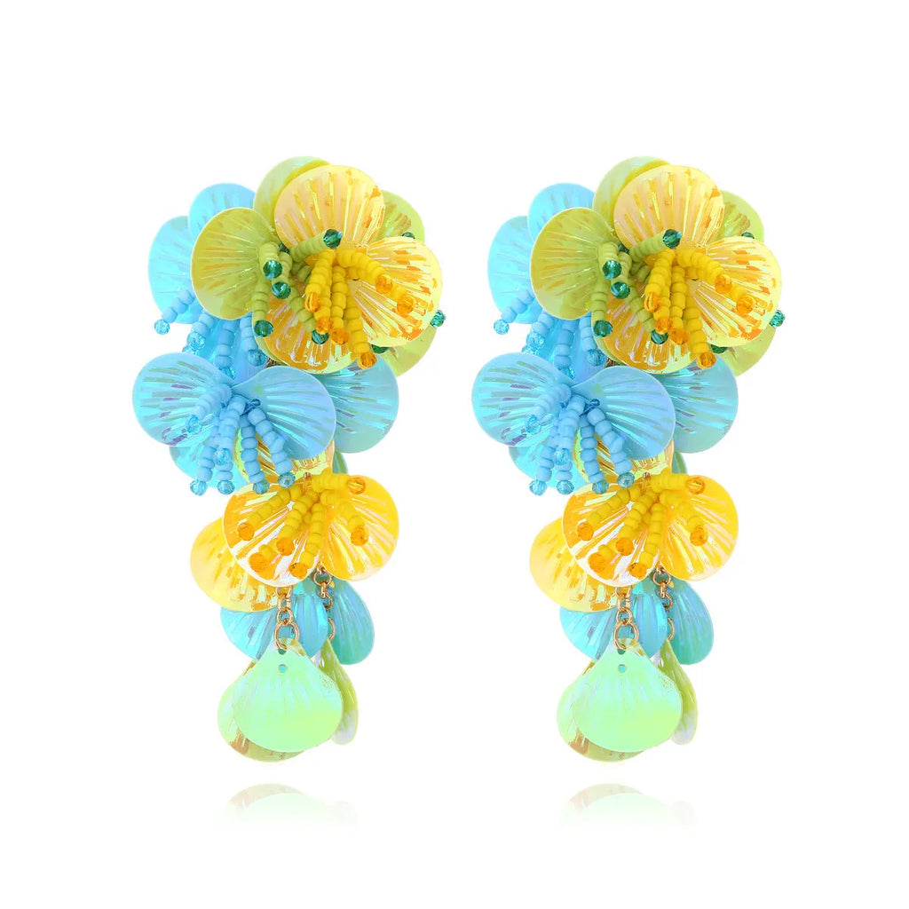 Handmade colourful string bead flower and leaf earrings in European and American exaggerated style.