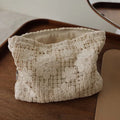 Handmade crocheted hollow flower cosmetic bag in corduroy fabric with ethnic embroidery decoration