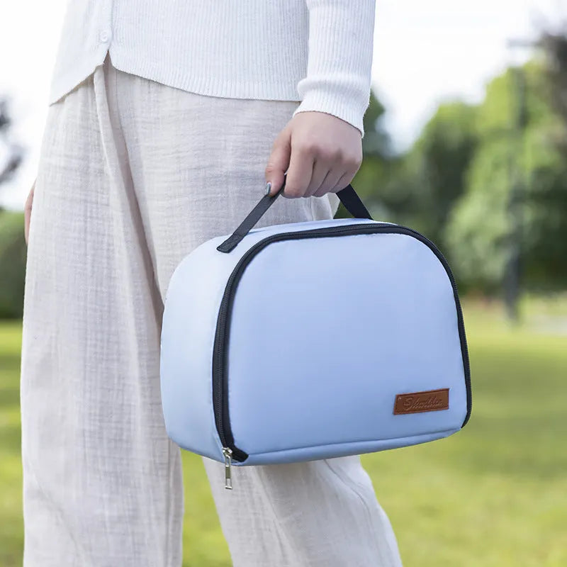 Insulated lunch bag with textured cloth construction in five colour options