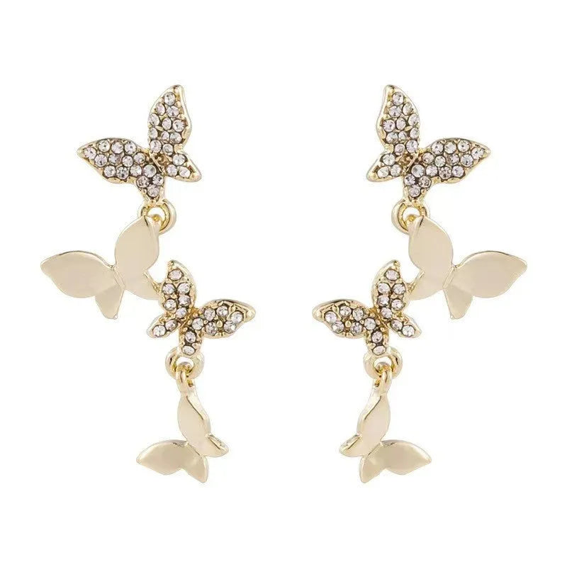 Women's copper butterfly earrings with four butterfly design and gold-coloured drops