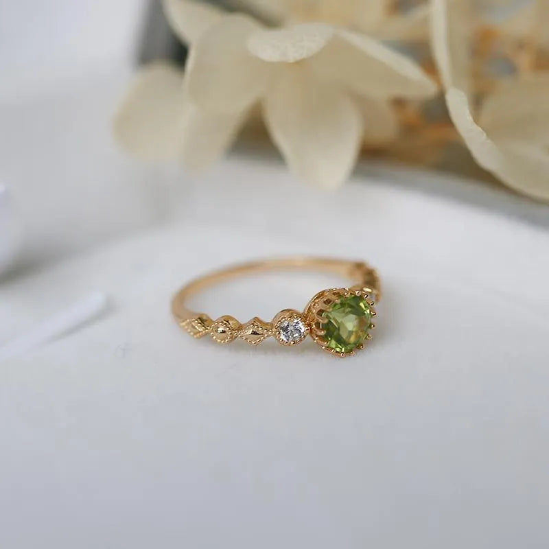 Japanese style geometric copper ring with quadrilateral design and imitation peridot colouration