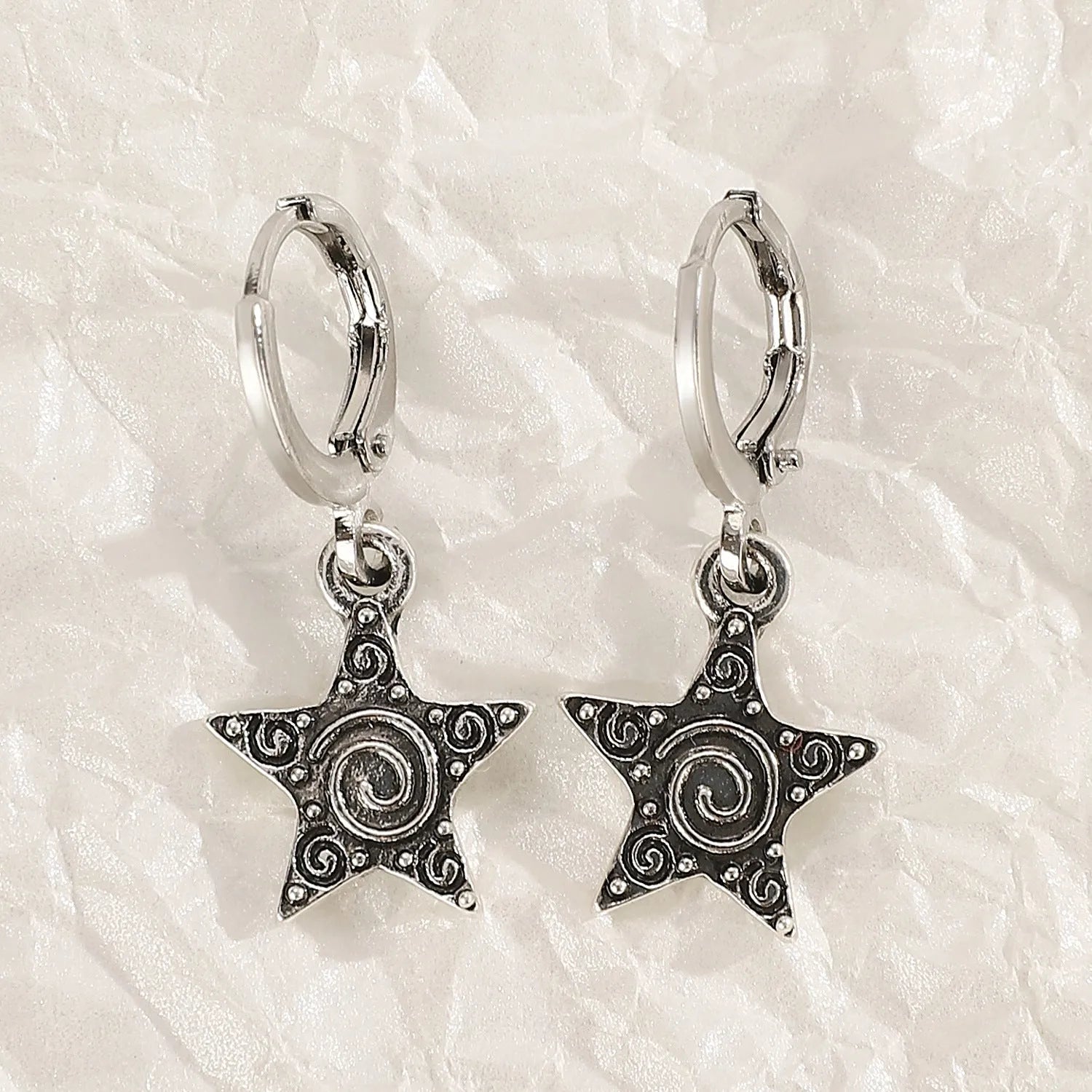 Women's cross crystal earrings in five colour variations with alloy construction and geometric design