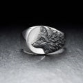 Silver geometric wolf head men's ring shown from multiple angles on a hand