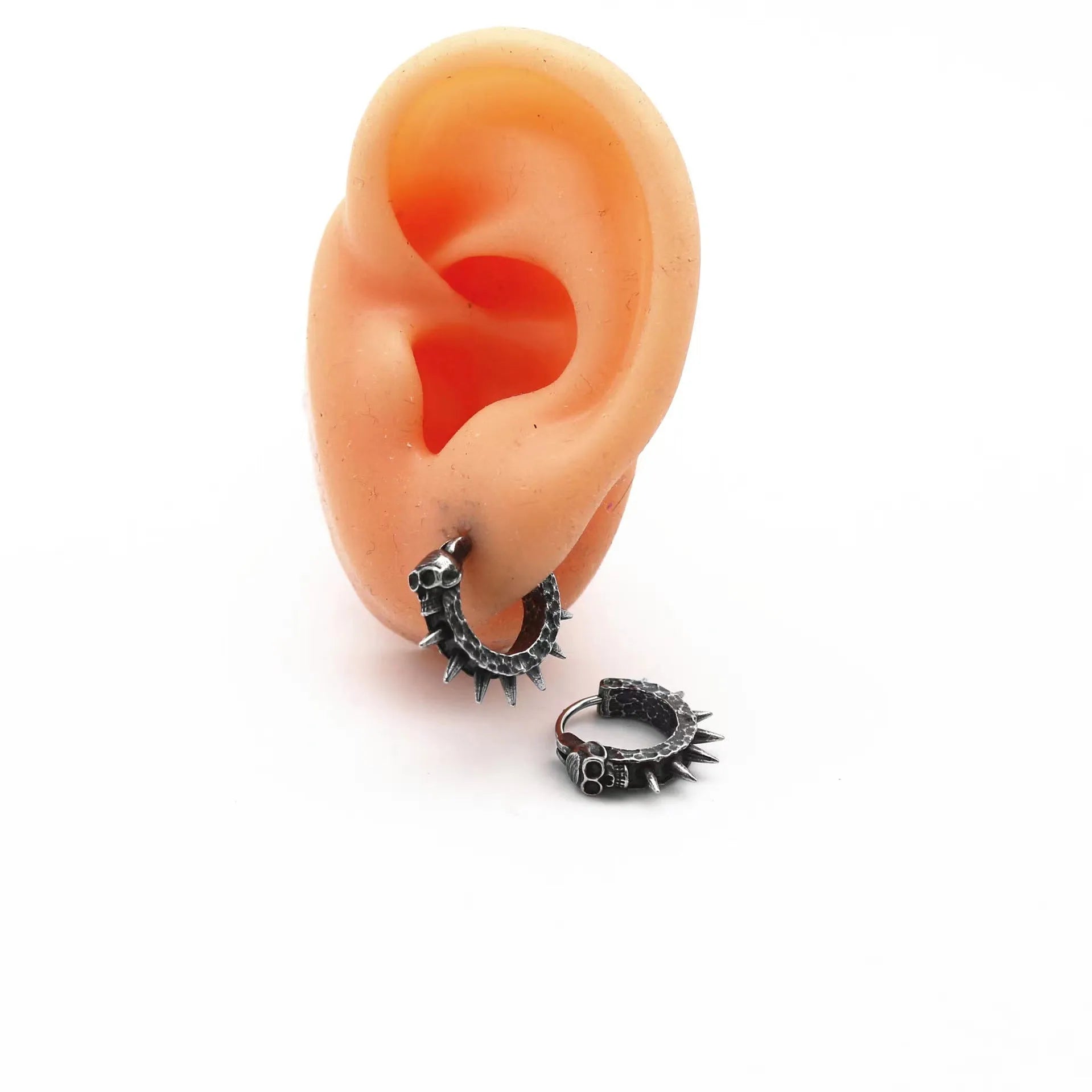 Black geometric punk motorcycle earrings made from alloy with copper plastic details.