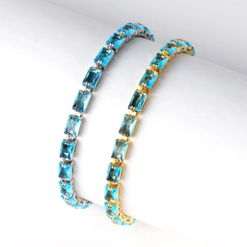 Close-up of a women's ins style bracelet with electroplated alloy band and sparkling zircon stones in a choice of colours.