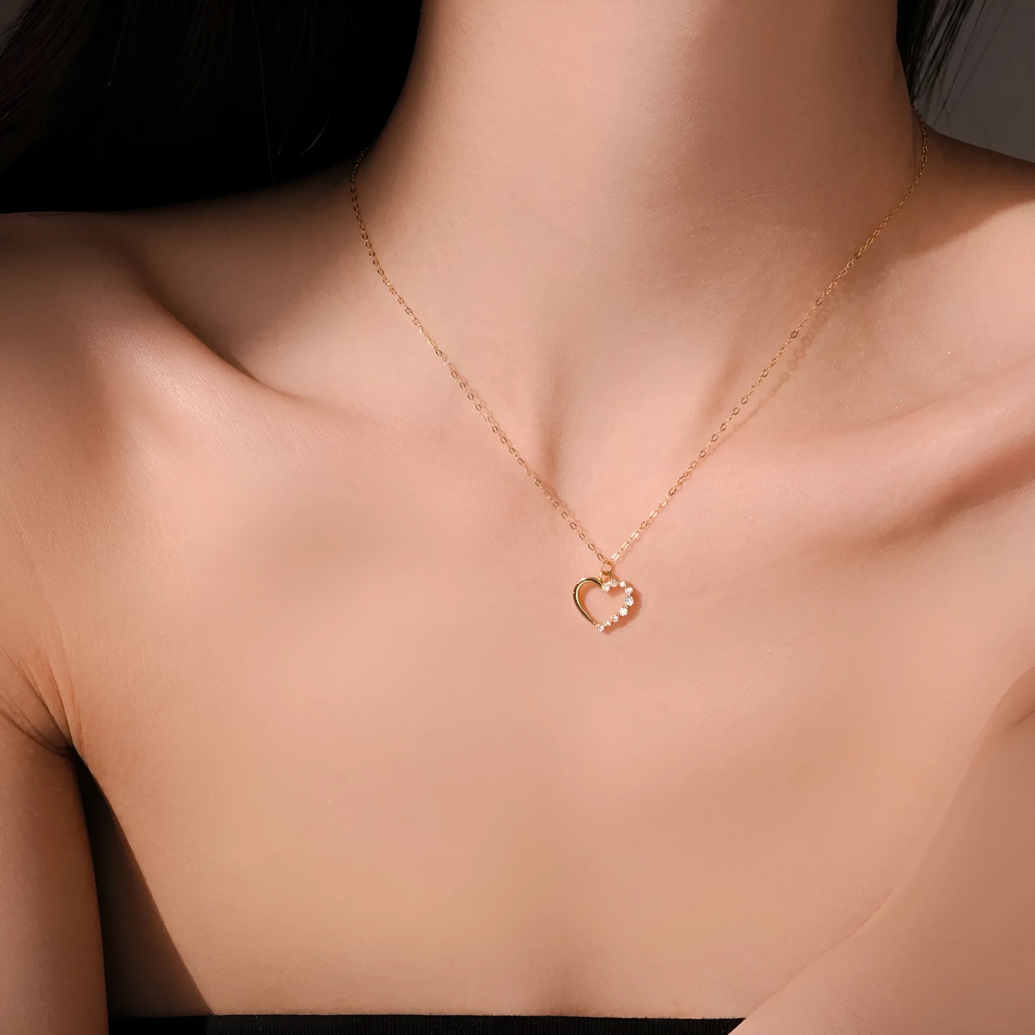 S925 sterling silver hollow heart pendant necklace on a regular chain, shown in gold and platinum colour options.