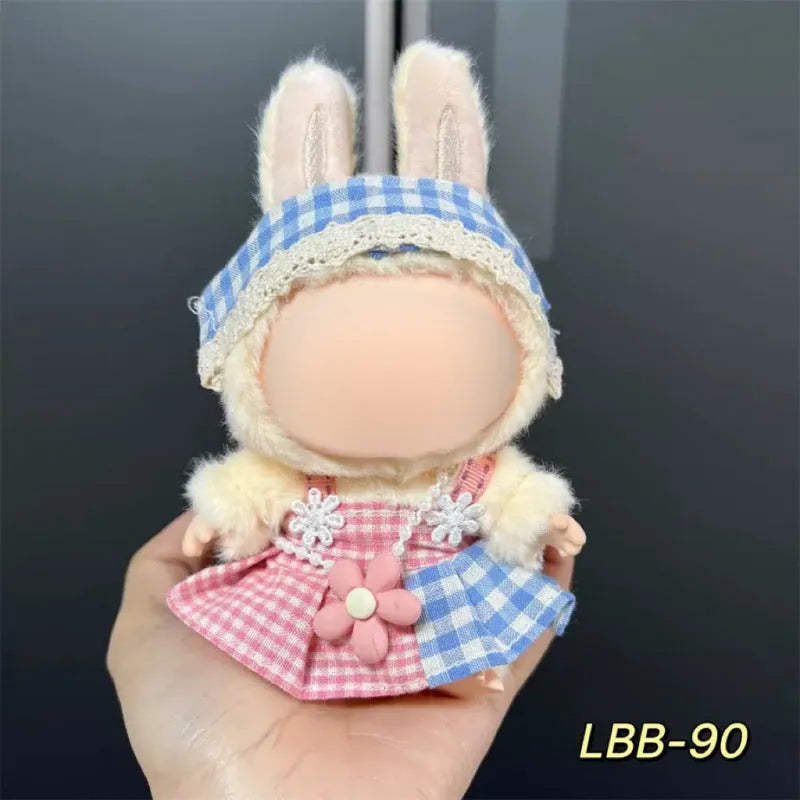 Plastic doll clothes costume for a 17cm vinyl action figure on a white background