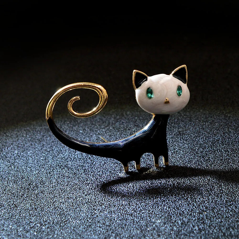 Personalised painted tail up kitty brooch in alloy metal with white or orange colour options