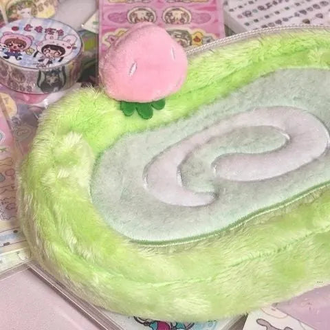 Honeydew Roll plush velvet pencil case with Swiss roll cake design for stationery storage.