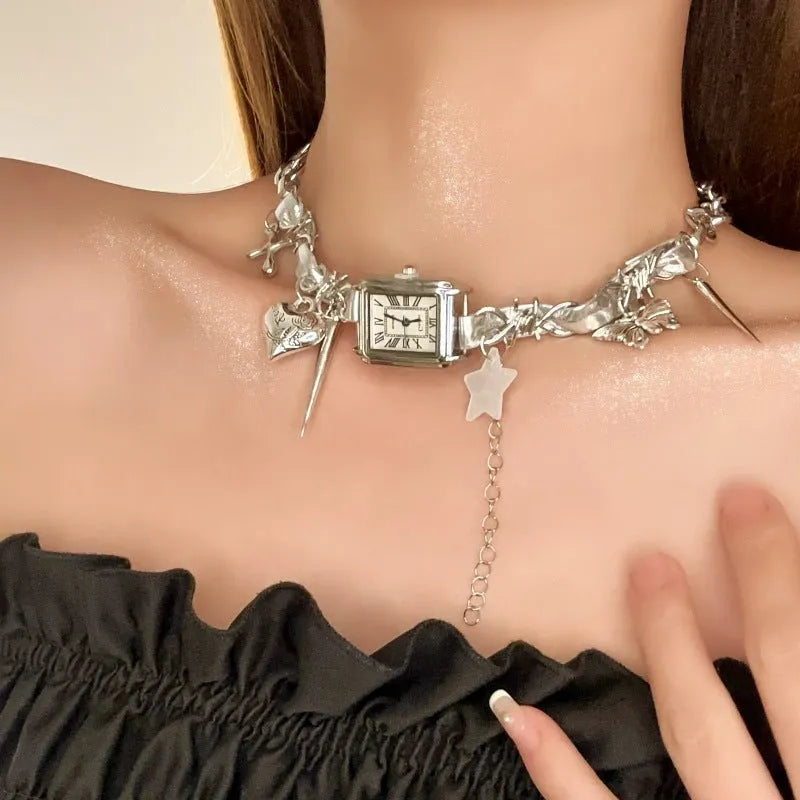 Dark multi-layer cross necklace with twin clavicle chains on model