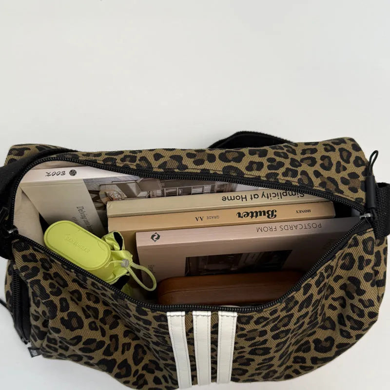 Leopard print sports style cross-body messenger bag with large capacity and durable stitching
