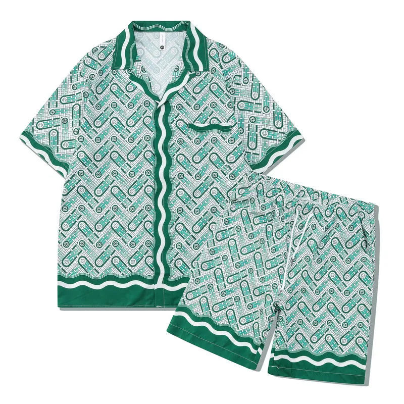 Men's and women's plaid print beach shirt and trouser casual outfit set on a hanger.