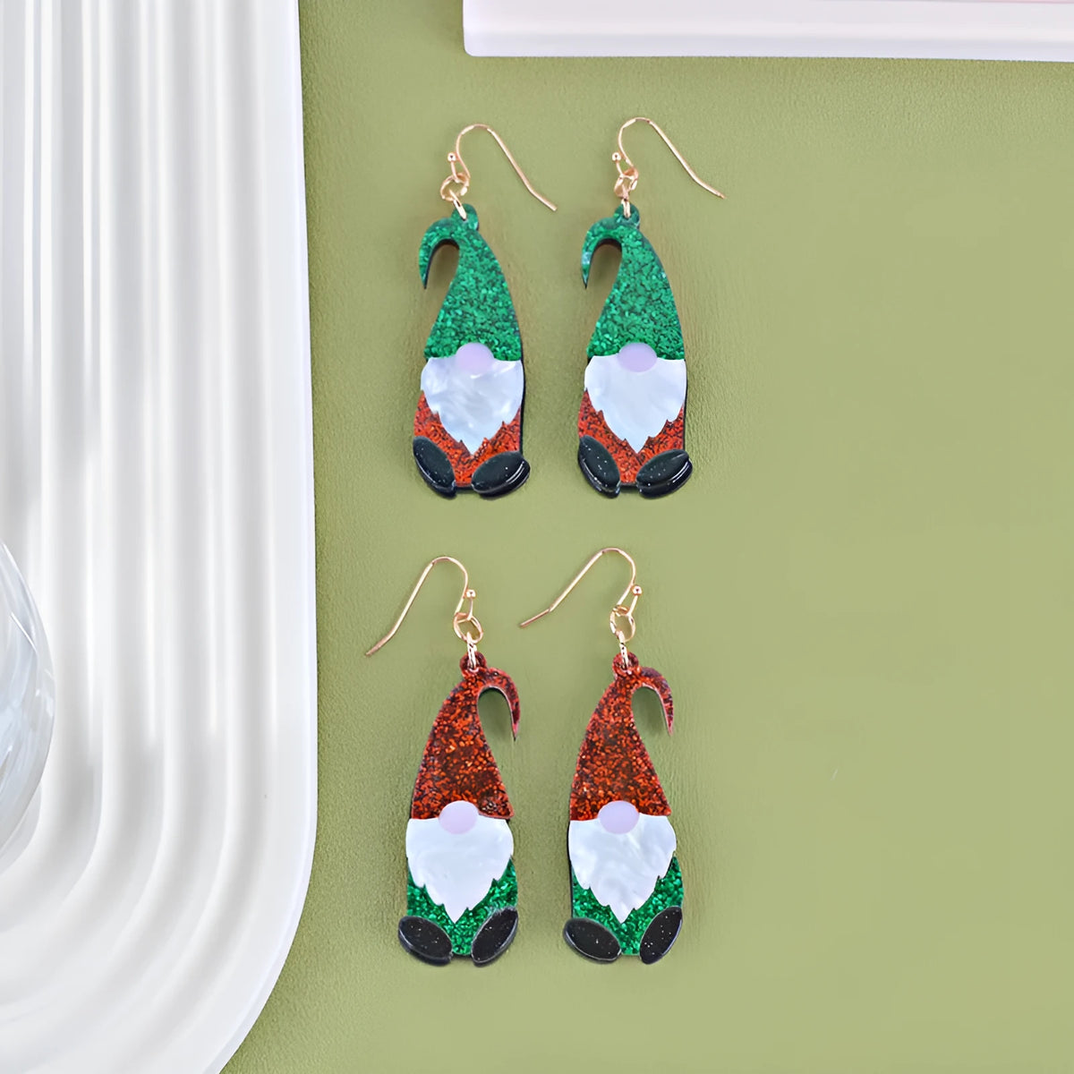 Santa Claus cartoon character acrylic fashion earrings showing red, green, and red/green hat colour options