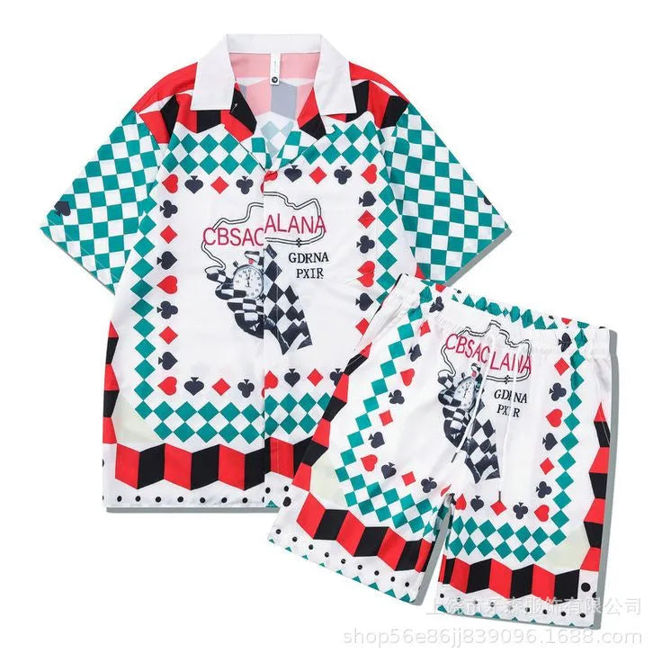 Men's and women's plaid print beach shirt and trouser casual outfit set on a hanger.