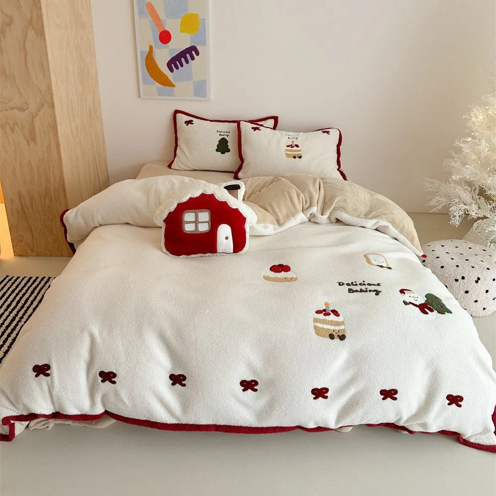 Winter Christmas cartoon pattern four-piece polyester bedding set showing heart design on duvet cover and pillowcases.