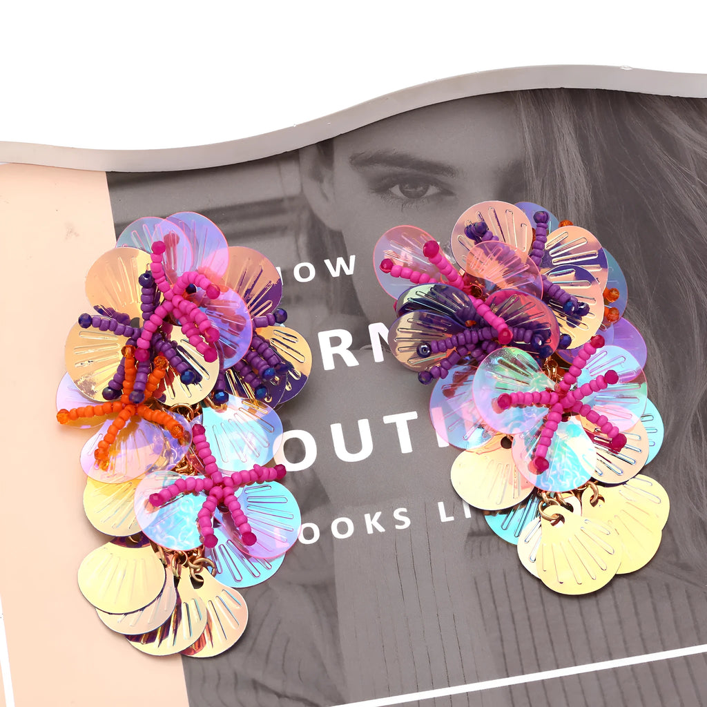 Handmade colourful string bead flower and leaf earrings in European and American exaggerated style.