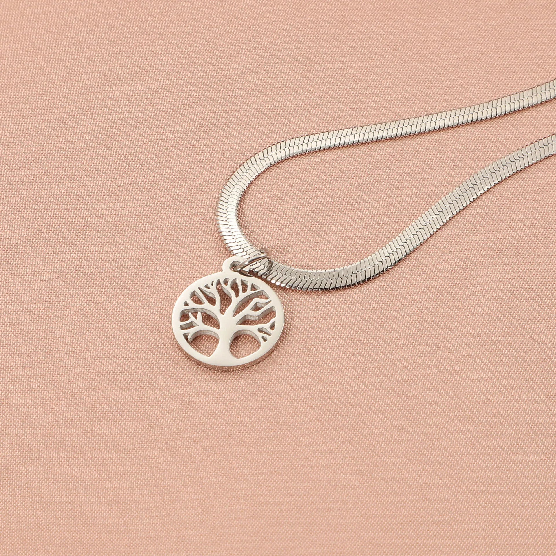 Stainless steel necklace with tree pendant on a snake bone chain in gold or steel colour.