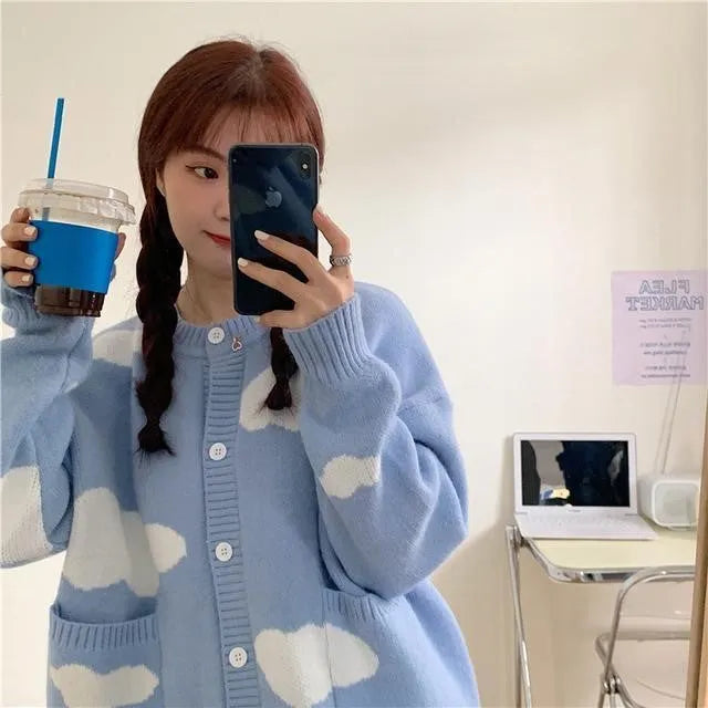 Women's blue cloud pattern cardigan sweater with long sleeves and loose fit