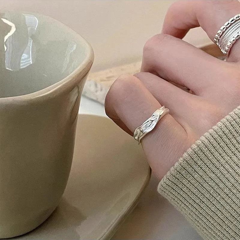Copper alloy geometric ring with woven twisted multilayer design and adjustable opening