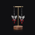 Silver alloy diamond bat nipple clamp with adjustable tension and ruby bat clip design