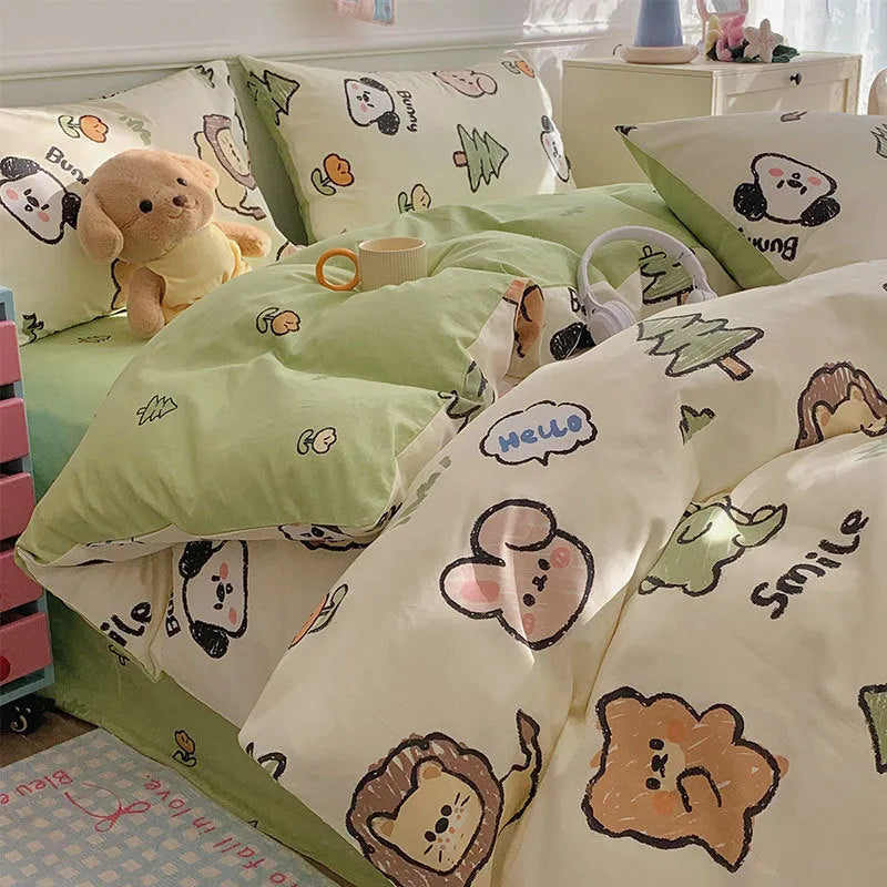 Cartoon dog patterned cotton four-piece bedding set laid on a bed.