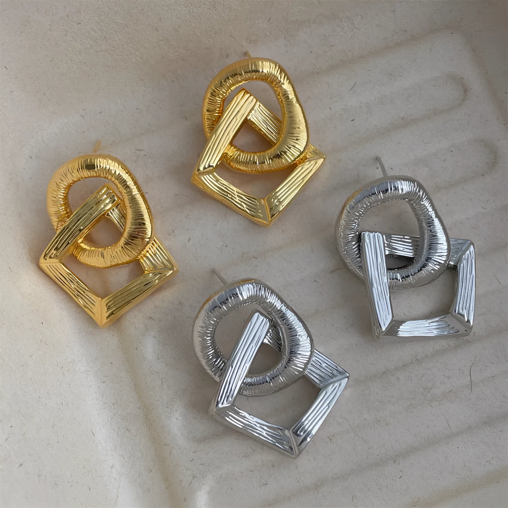 Retro geometric circle drop earrings in gold or silver colour with a 3.4cm copper pendant.
