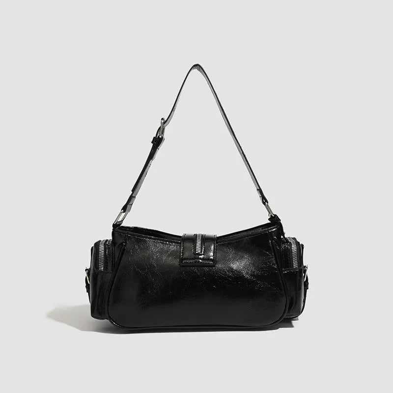 Black dumpling-shaped retro handbag with oil wax PU leather and organised interior compartments