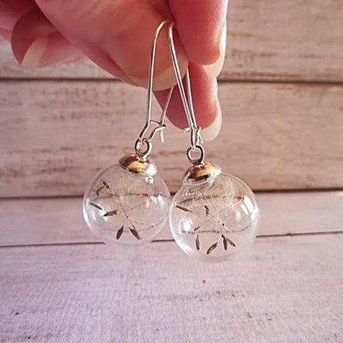Transparent glass ball earrings with dandelion seed design on silver French hook