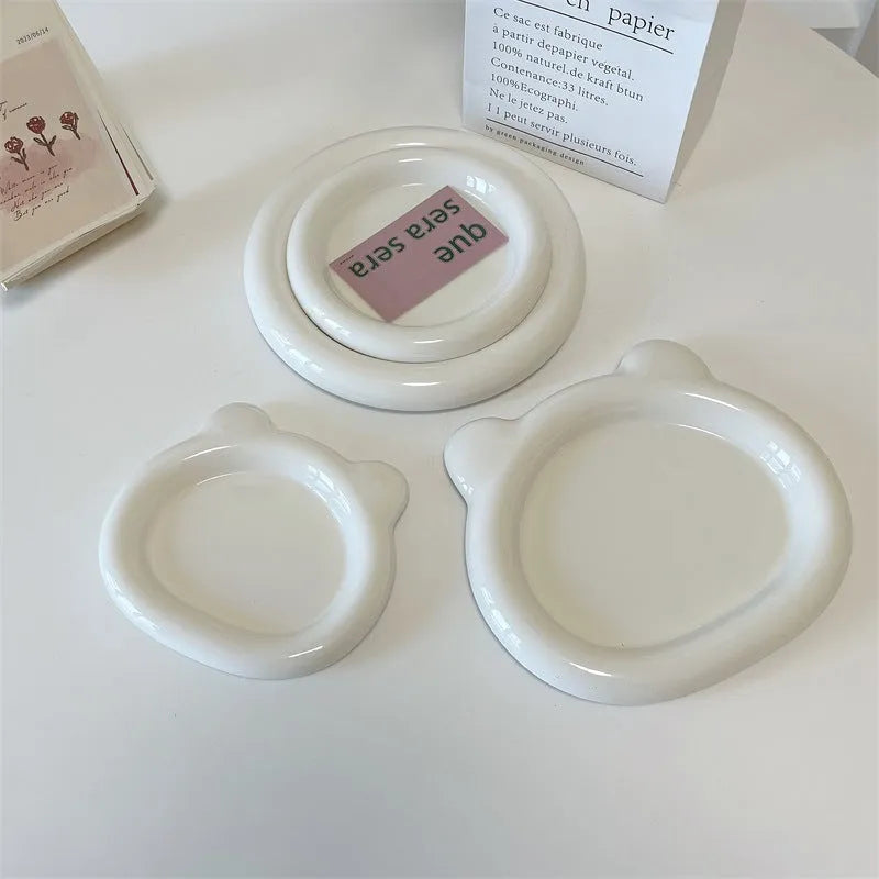 White ceramic plate with ins style bear doodle design, showing 15cm and 20cm size options.