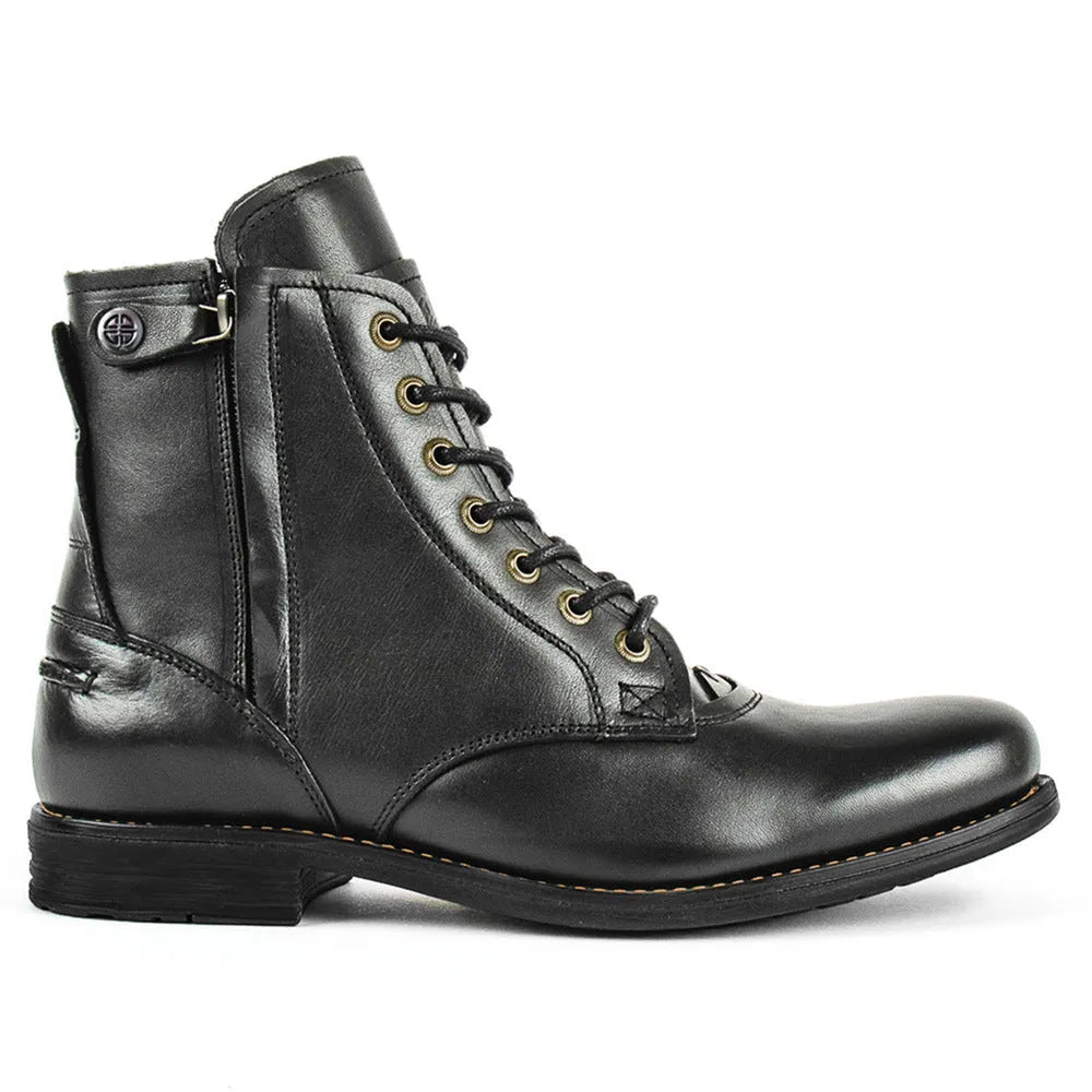 Black and brown two-tone leather ankle boots with side zipper and low heel.