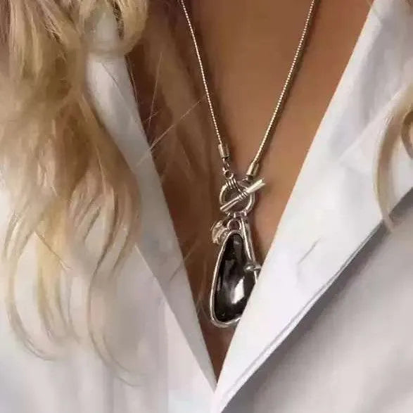 Women's long sweater chain necklace with geometric plaid pattern pendant on snake bones chain