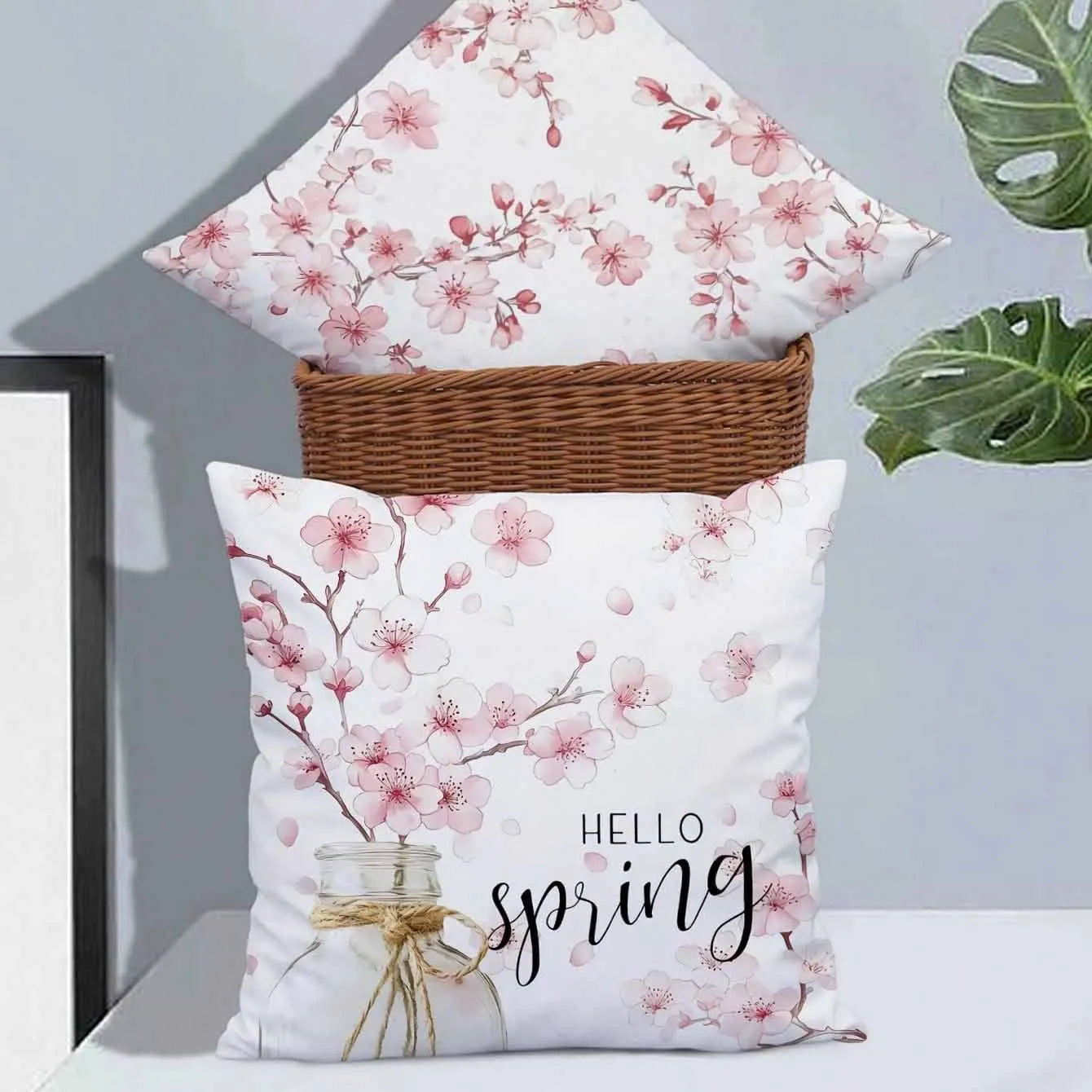 Square short velvet cushion cover with cherry blossom and letter design in 45x45cm size.