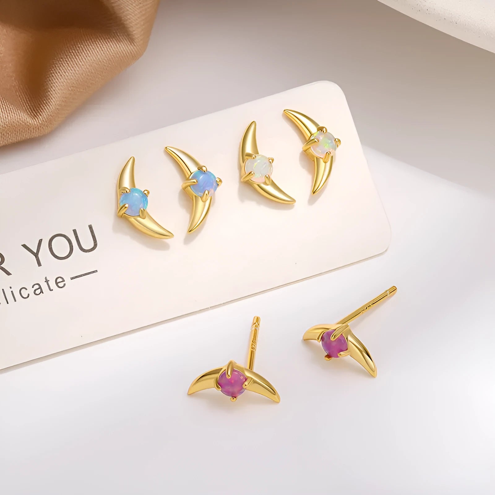 Women's geometric 925 silver earrings with electroplated gold or platinum finish and stone accents