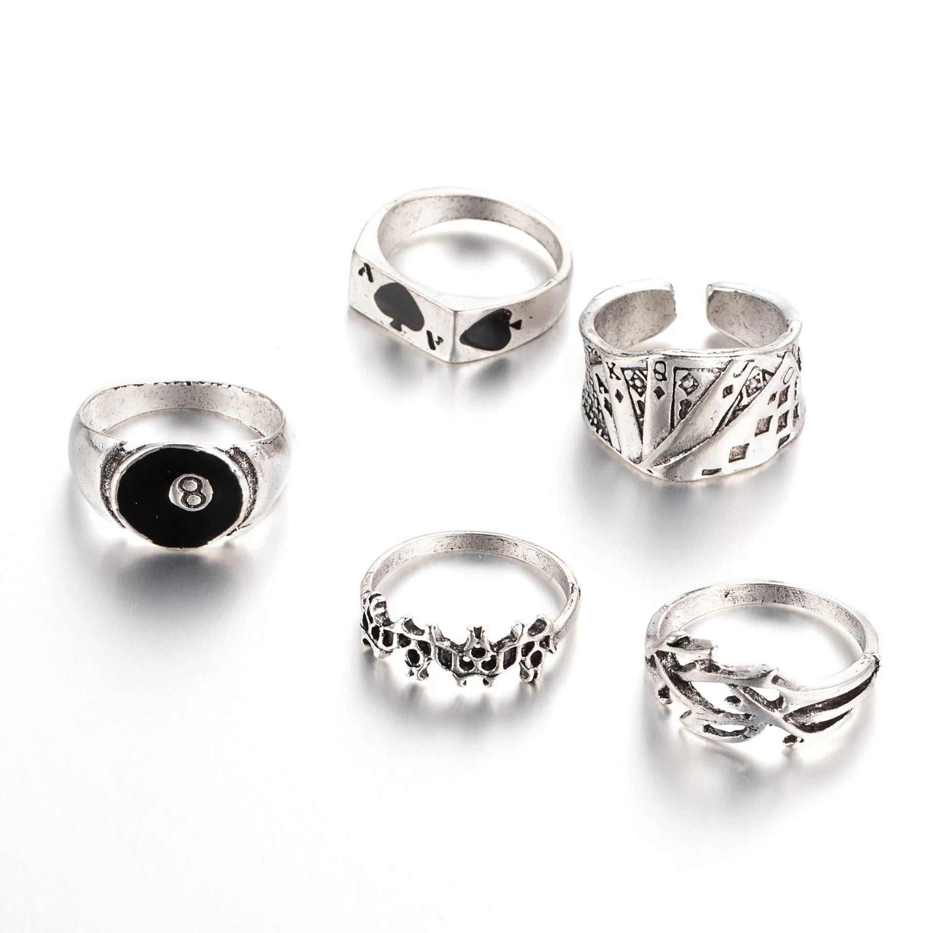 A black alloy ring for women featuring a raised retro poker card spade design.