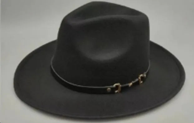 Brown leather velvet curved-edge western cowboy hat with a conical crown on a plain background.