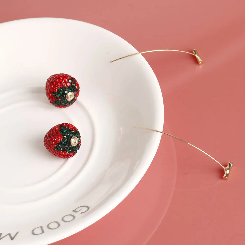 Geometric strawberry-shaped earrings with spot drill texture in red zinc alloy