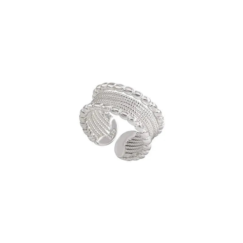 Copper alloy geometric ring with woven twisted multilayer design and adjustable opening