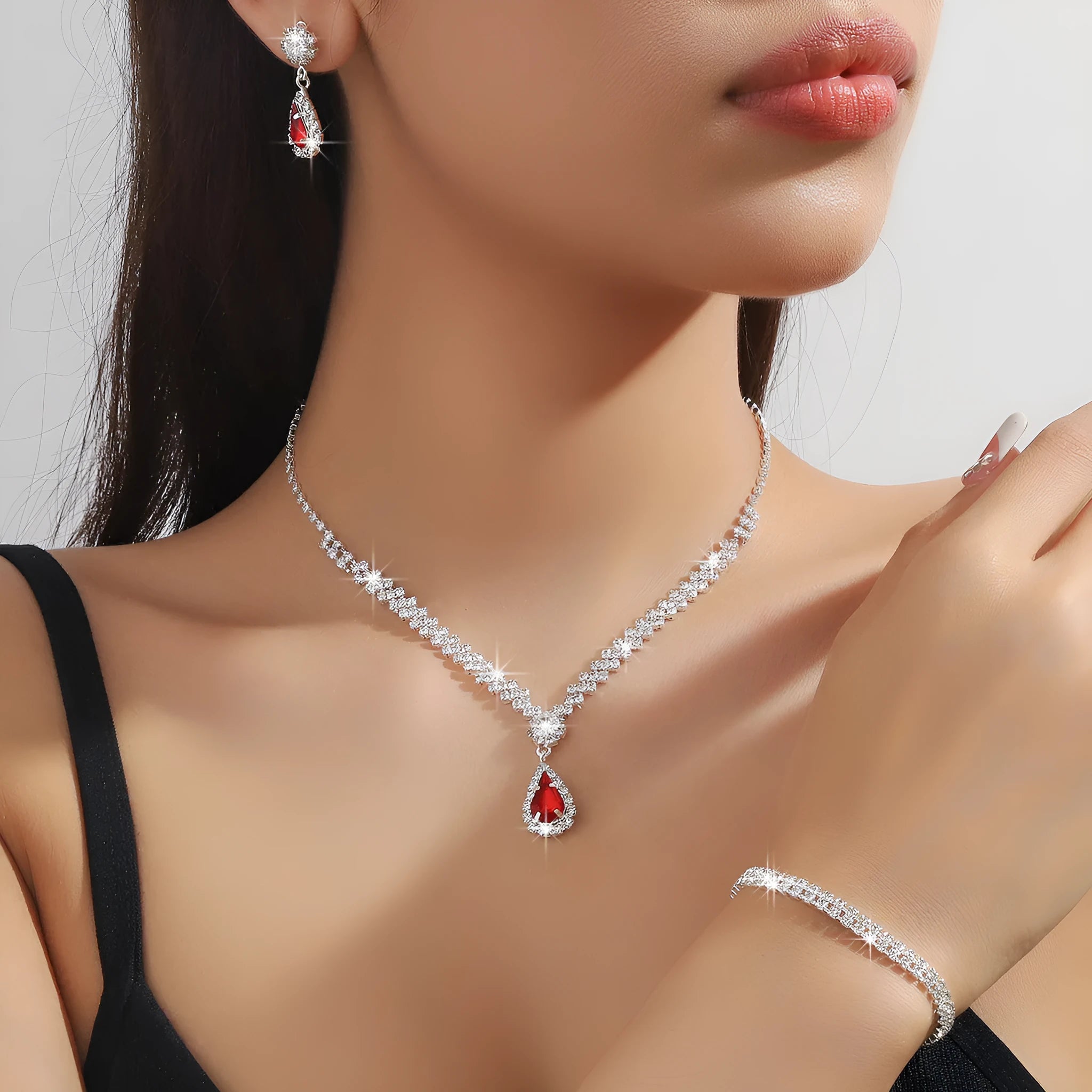 Claw chain necklace and earrings set with water drop rhinestone pendants in multiple colour options