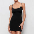 Black slim-fit sling sheath dress on a mannequin, showing sleeveless design and mid-waist.