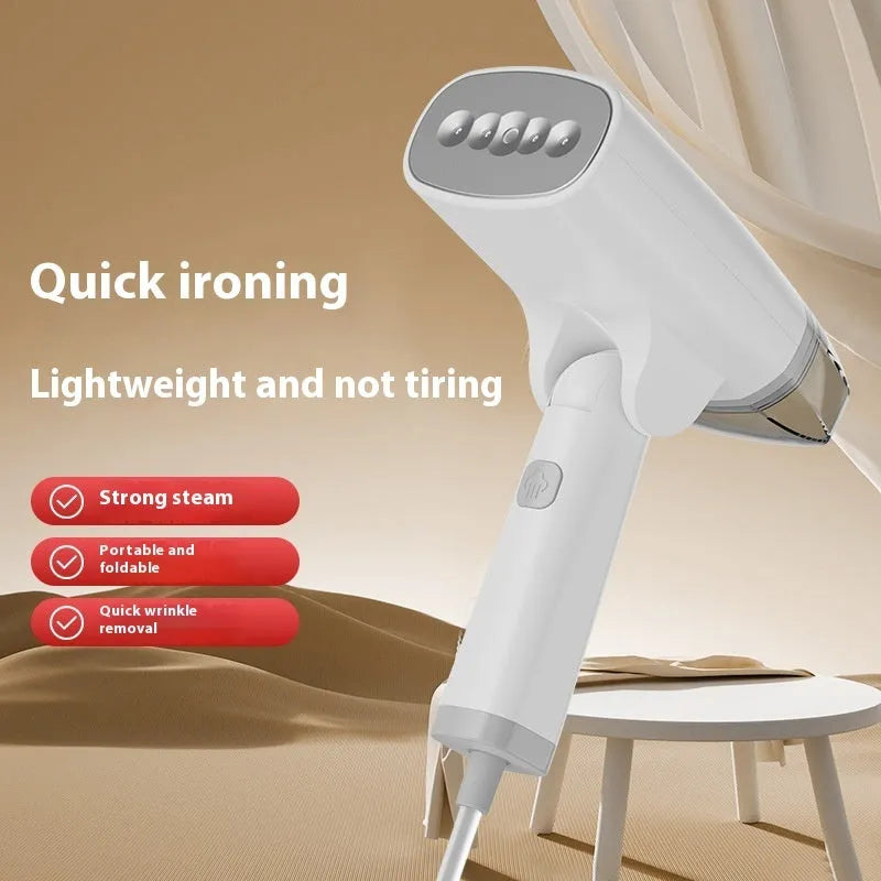 Blue and white handheld garment steamer with water tank and power cord on a white background.