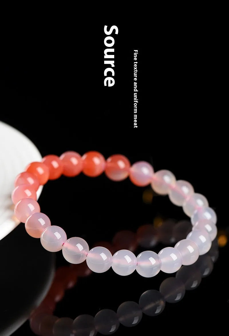 Natural gradient Yanyuan agate bracelet showing colour variation on geometric beads in single circle design